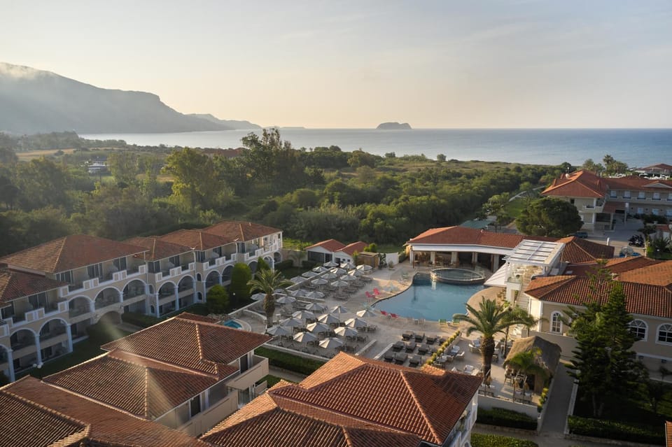 Property building, Bird's eye view, Beach, Pool view