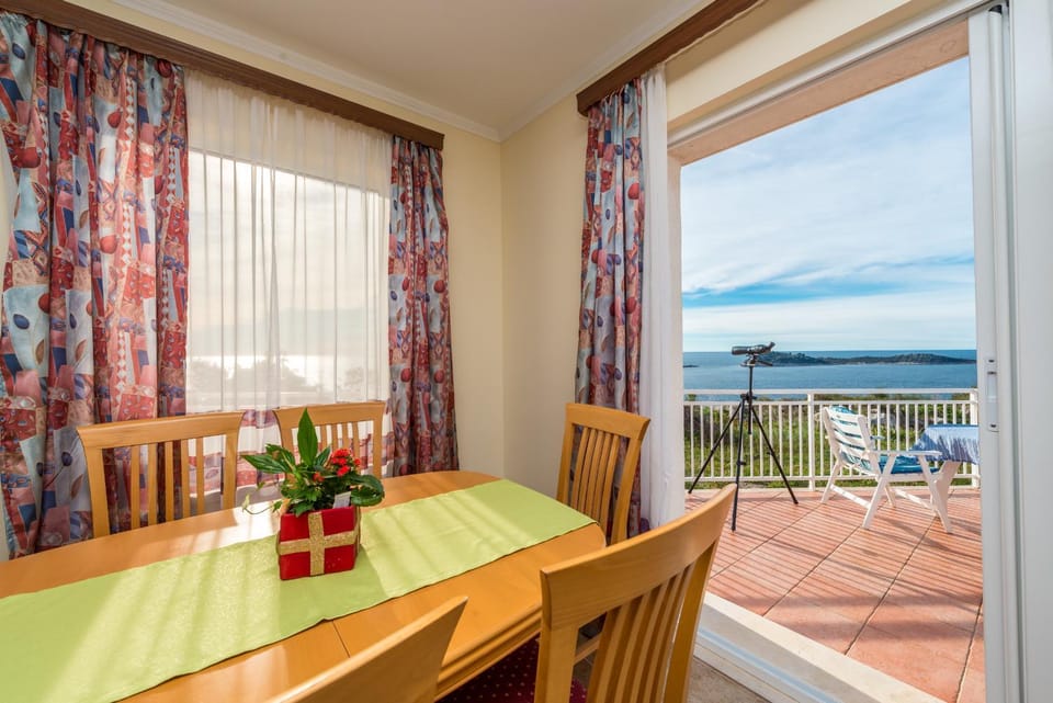 Living room, Seating area, Dining area, Sea view