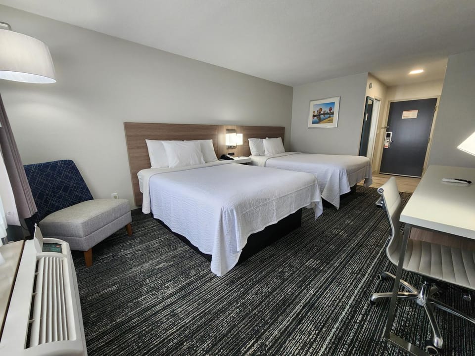 Bed, TV and multimedia, Seating area, Bedroom, hair dresser
