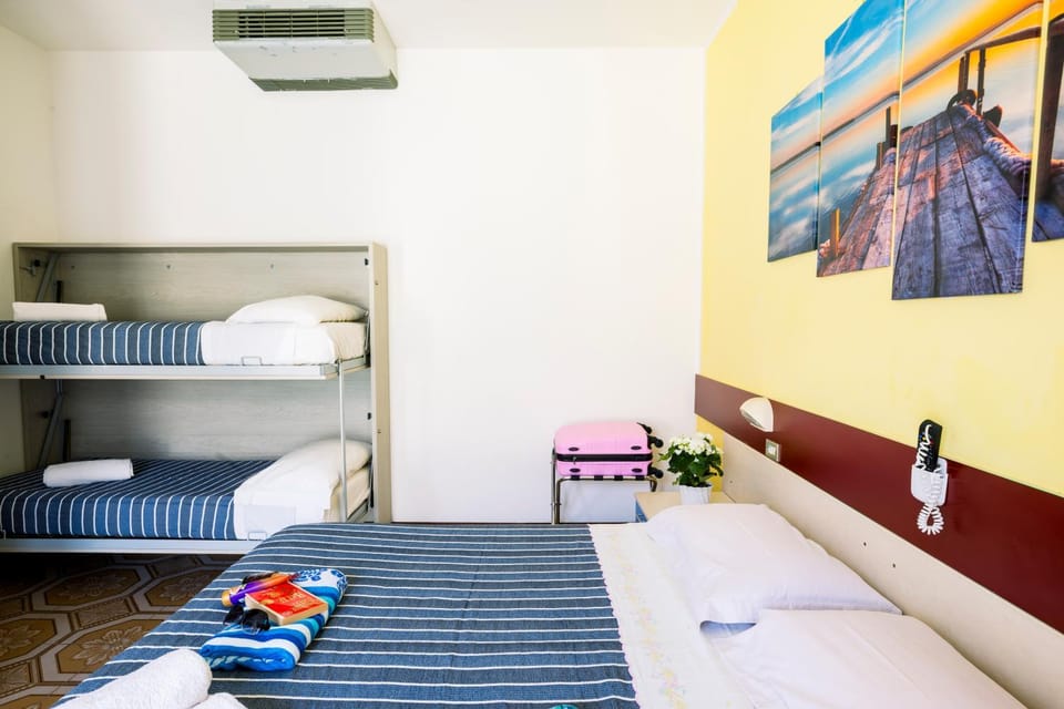 Photo of the whole room, Bedroom, bunk bed, towels, air conditioner