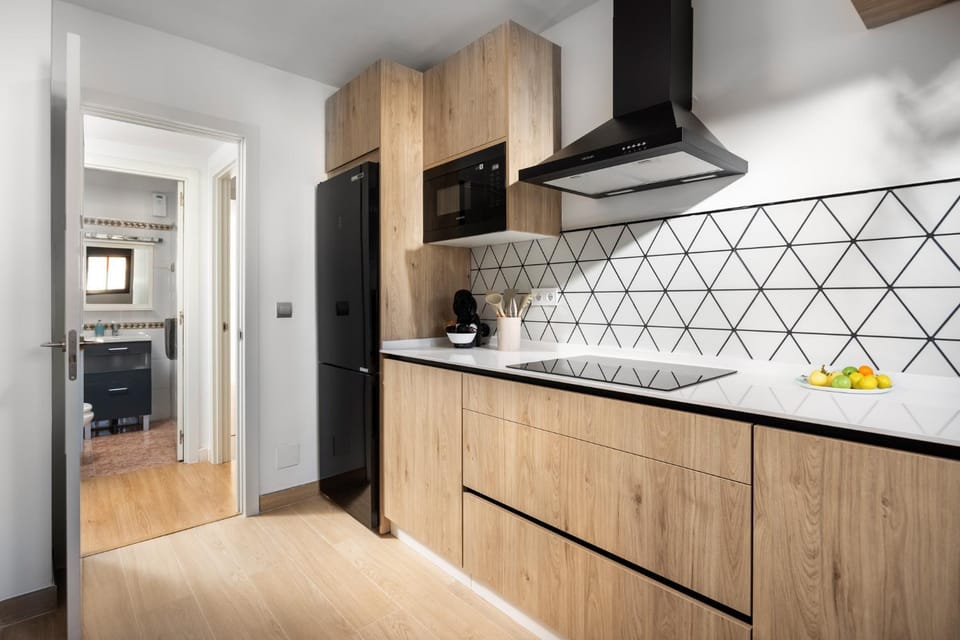 Kitchen or kitchenette, dishwasher, microwave, stove