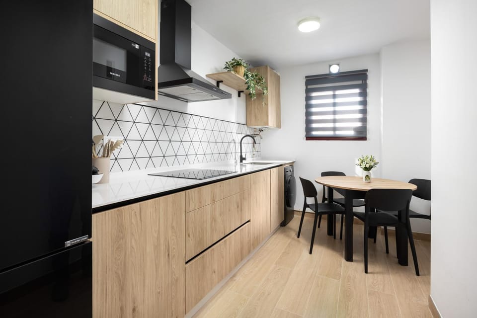 Kitchen or kitchenette, Dining area, dishwasher, microwave, stove, washing machine