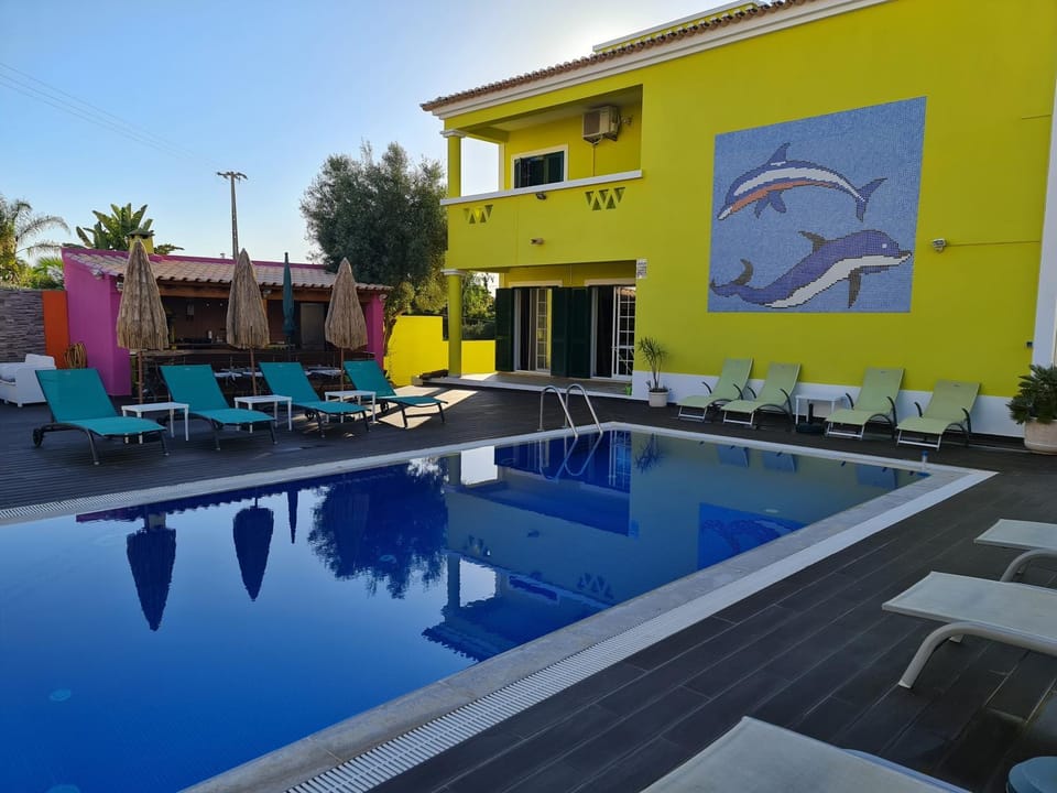 Property building, Swimming pool, sunbed