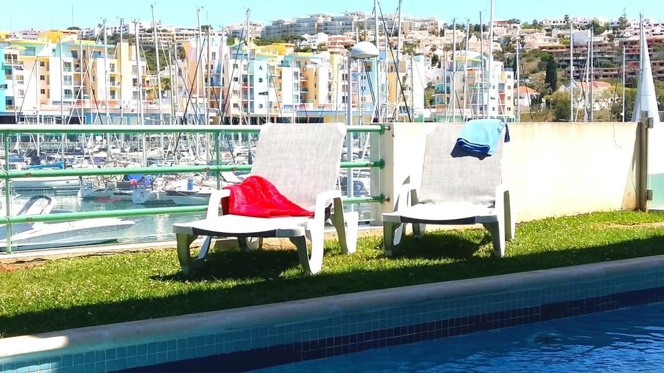 Swimming pool, sunbed