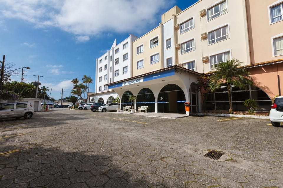 Property building, Facade/entrance, Day, Parking