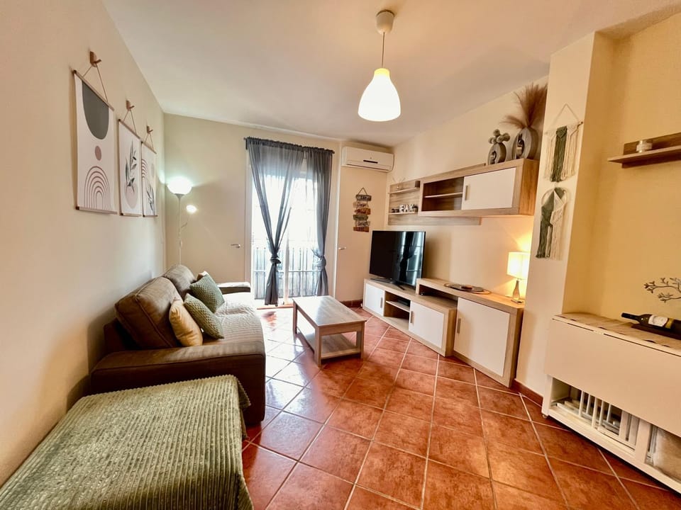 Communal lounge/ TV room, TV and multimedia, Living room, Photo of the whole room, Decorative detail, Decorative detail, Seating area, Family, Family, air conditioner