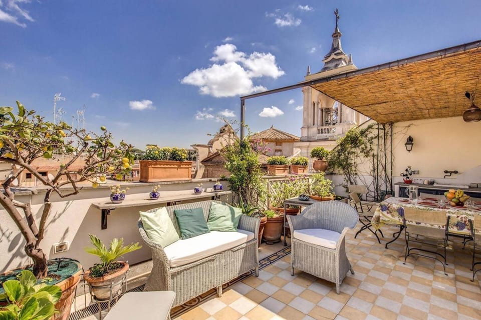 Attic with Terrace Overlooking St Peter's Basilica Apartment in Rome