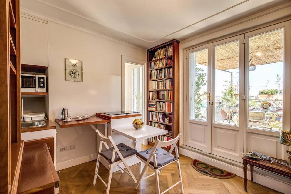 Attic with Terrace Overlooking St Peter's Basilica Apartment in Rome