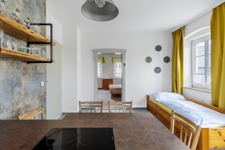 Bed, Kitchen or kitchenette, Seating area