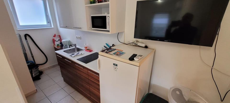 Kitchen or kitchenette, stove