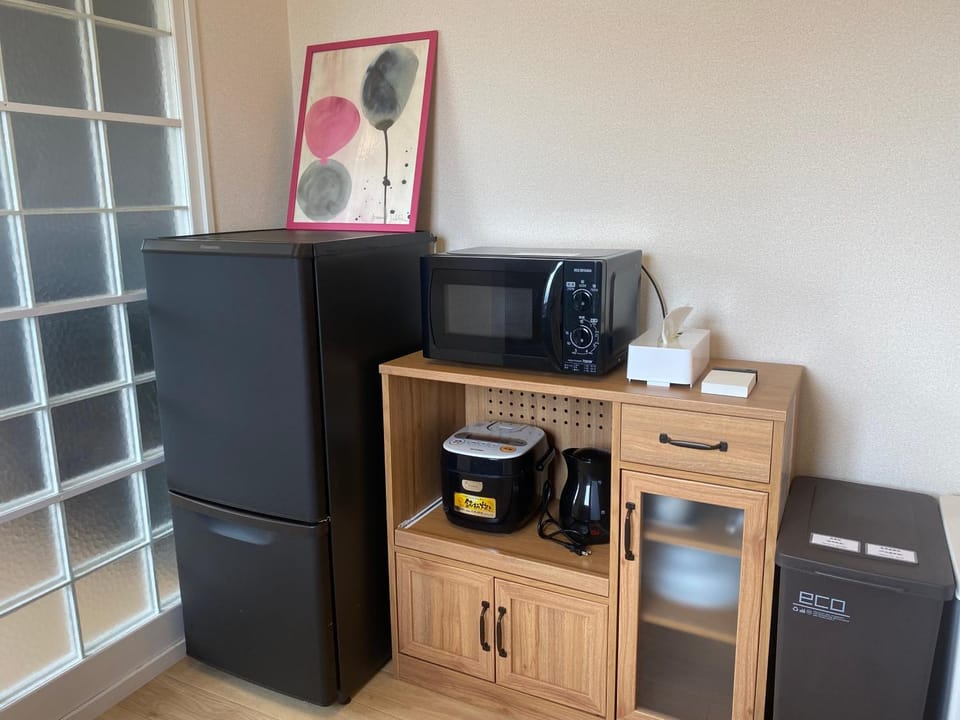 Kitchen or kitchenette, microwave