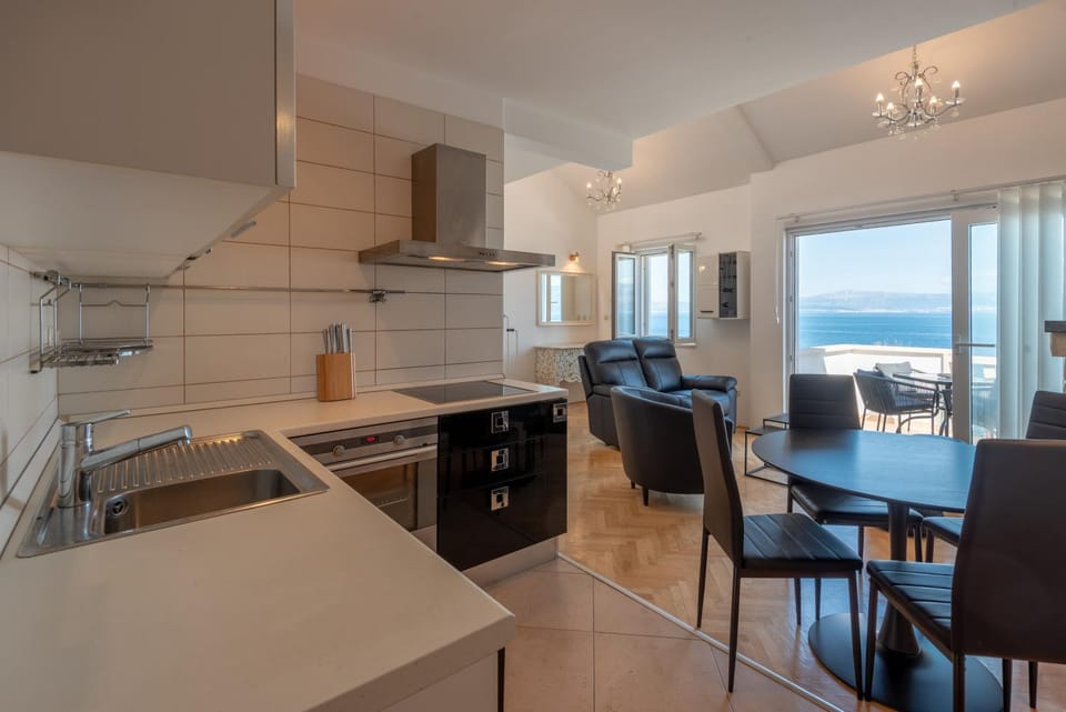 APARTMENTS BRUNO 1&2 - two-room penthouse apartments - wonderful panoramic view of the sea - the best location, first row to the beach - 10 minutes from Supetar ferry port - free secured parking - facilities nearby Apartment in Split-Dalmatia County