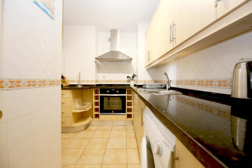 Kitchen or kitchenette, oven, stove