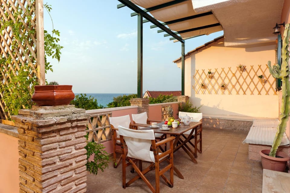 Patio, Summer, Balcony/Terrace, Balcony/Terrace, Photo of the whole room, Decorative detail, Seating area, On site, Garden view, Garden view, Mountain view, Sea view, Sea view, Sunset