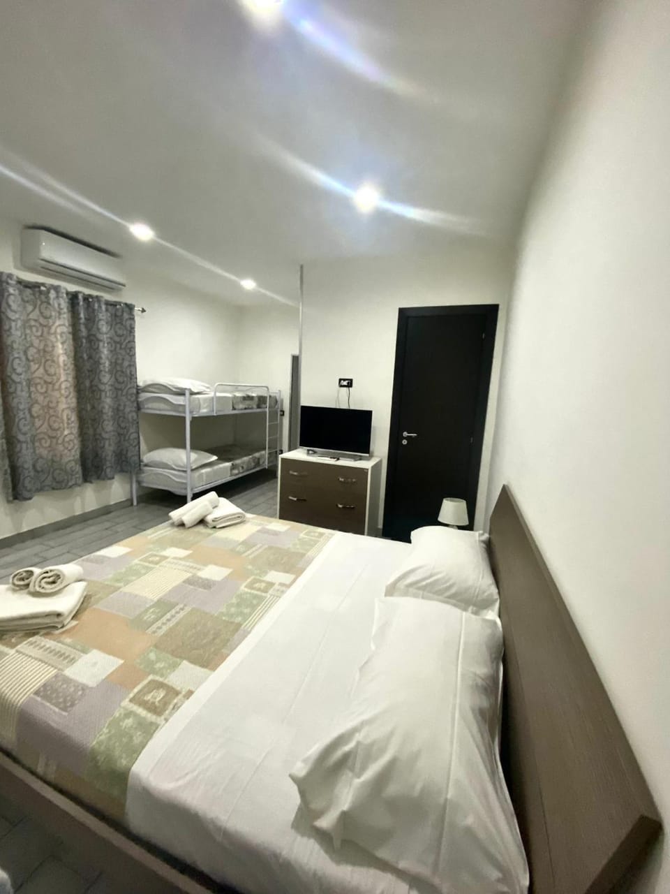 Inner courtyard view, locker, towels, air conditioner