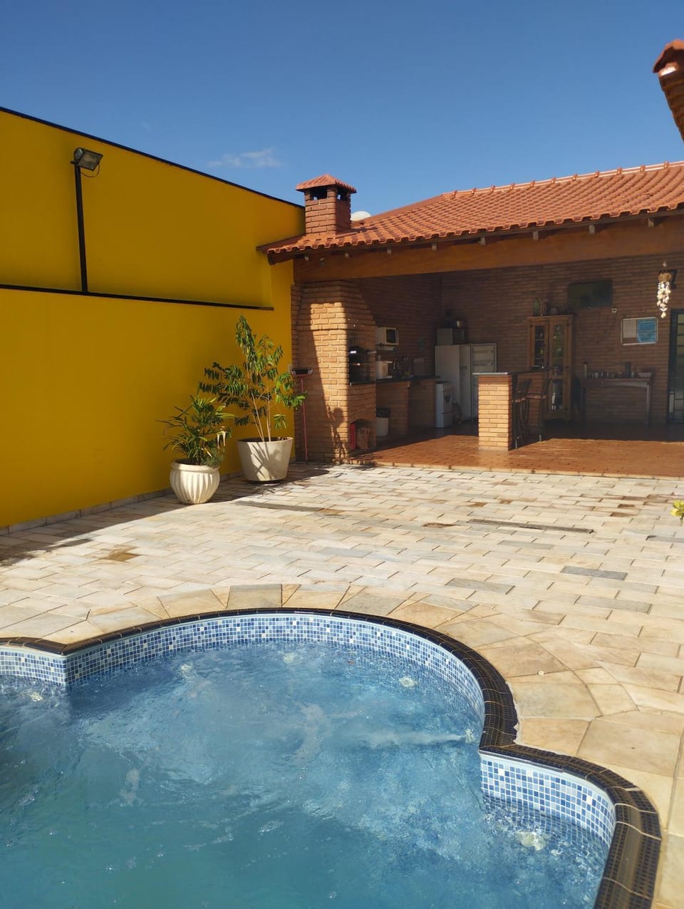 Property building, Patio, Day, Pool view, Swimming pool