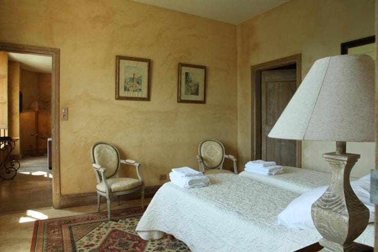 Bed, Living room, Seating area, Bedroom