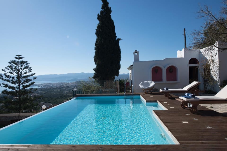 Property logo or sign, Seating area, Swimming pool, Swimming pool