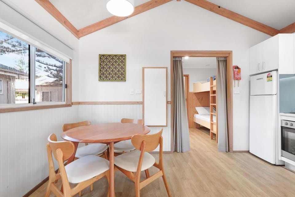 Dining area, bunk bed, oven, stove