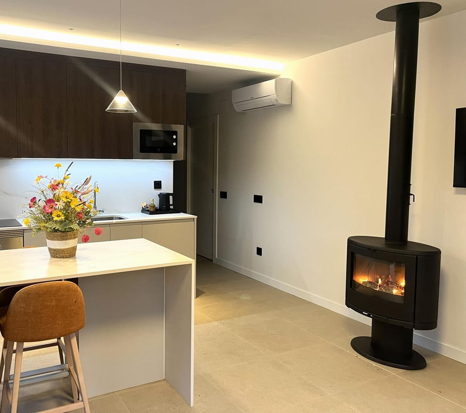 Living room, fireplace, kitchen