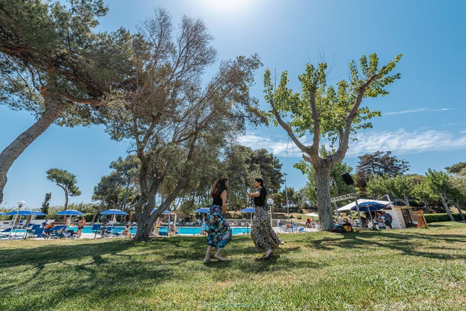 People, Natural landscape, Garden, Garden view, Swimming pool, group of guests