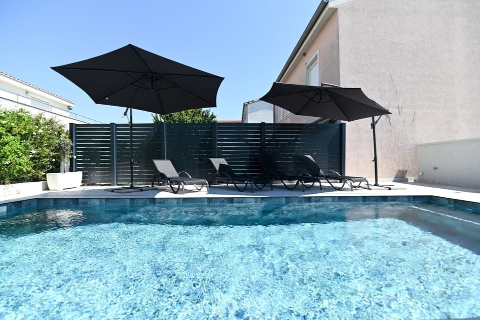 Patio, Day, Pool view, Swimming pool, sunbed