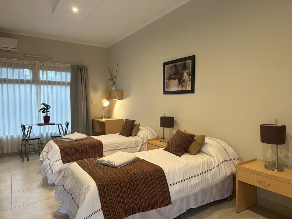 Bed, Photo of the whole room, Seating area, Bedroom, air conditioner