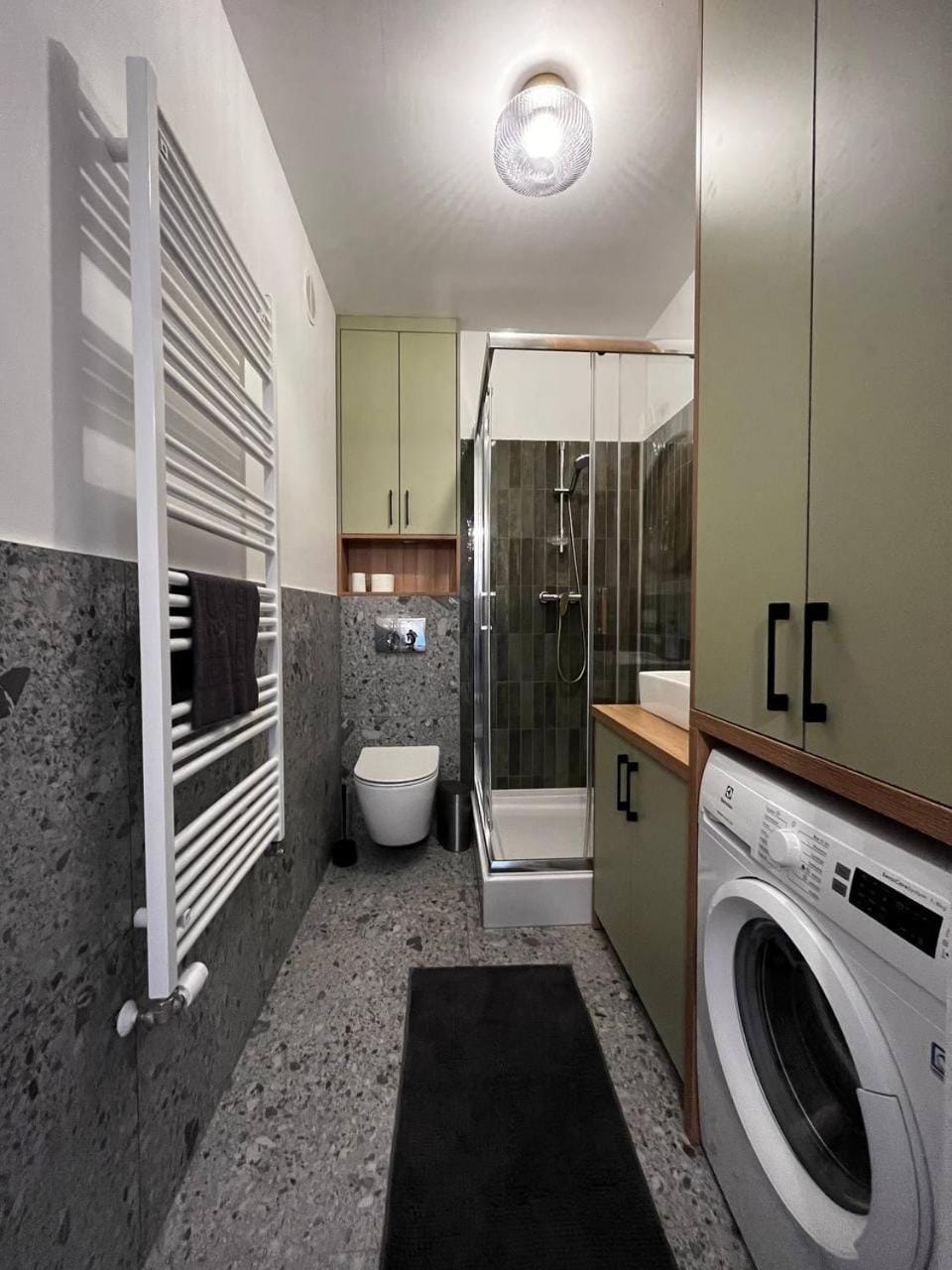 Shower, Toilet, Bathroom, towels, washing machine, dryer