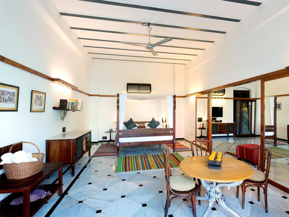Bed, Living room, Seating area, Bedroom