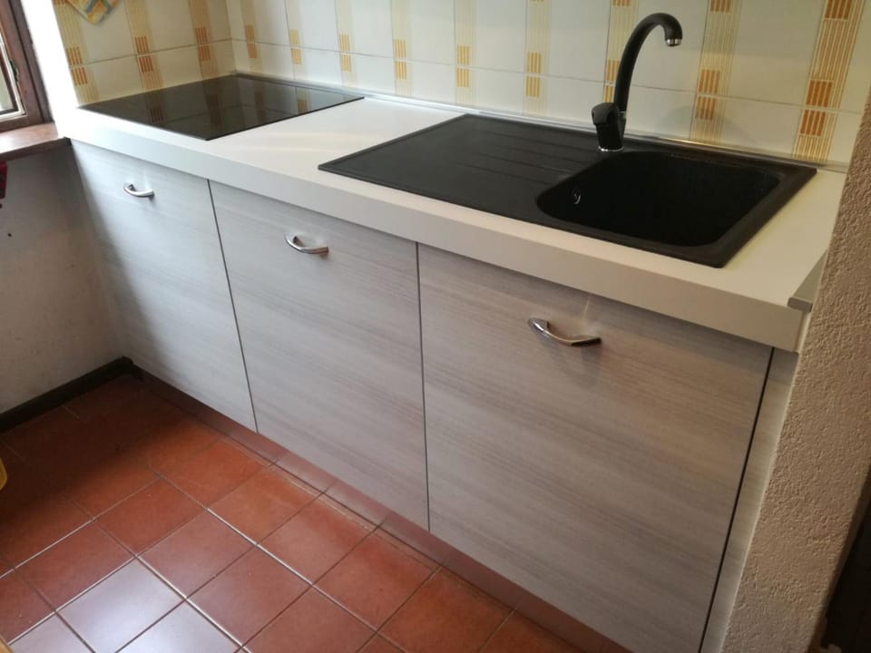 Kitchen or kitchenette, stove