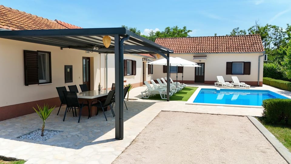 Property building, Pool view, Swimming pool, sunbed