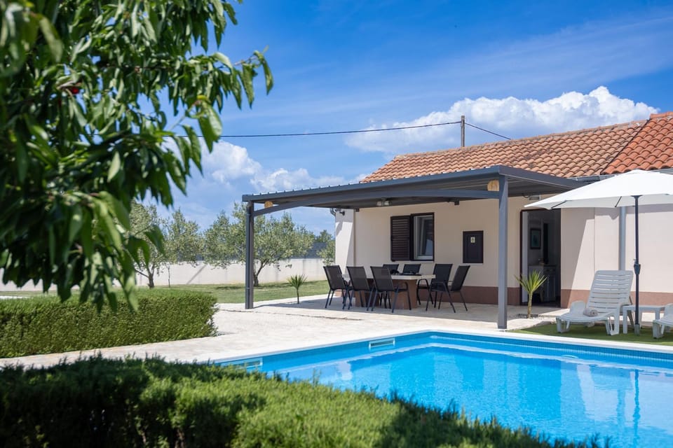 Property building, Patio, Day, Pool view, Swimming pool