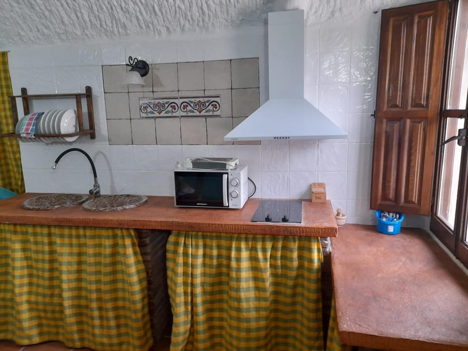 Kitchen or kitchenette, stove, toaster