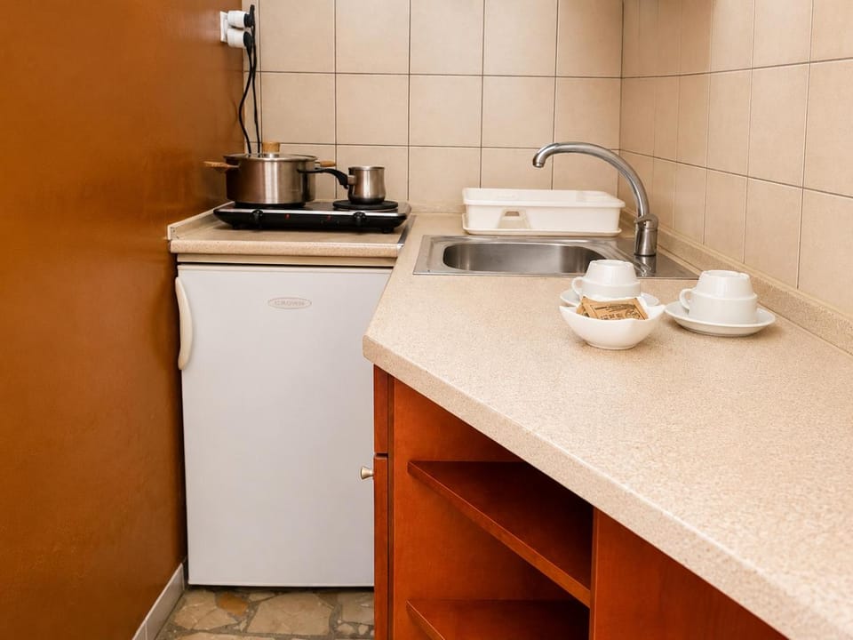 Kitchen or kitchenette, stove