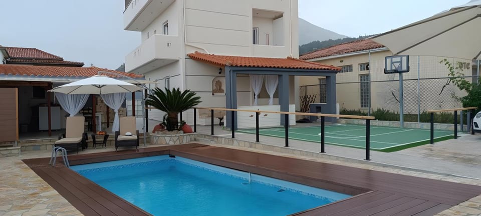 Property building, Living room, Swimming pool