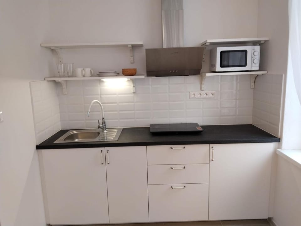 Kitchen or kitchenette, stove