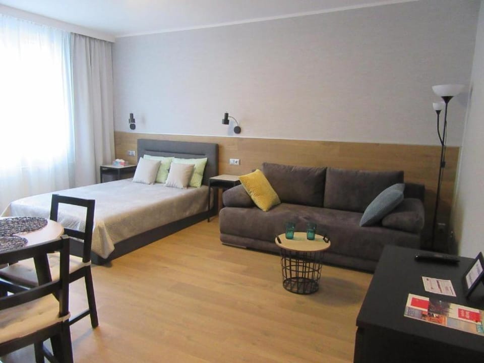 Bed, Living room, Seating area, Bedroom