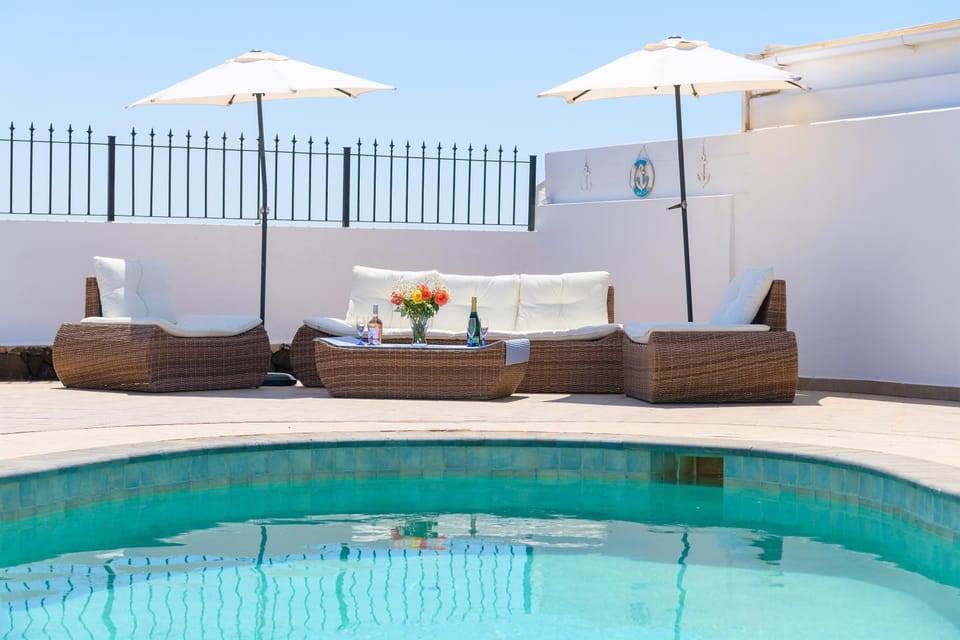 Property building, Seating area, Sea view, Swimming pool, Breakfast, Sunrise, Sunset