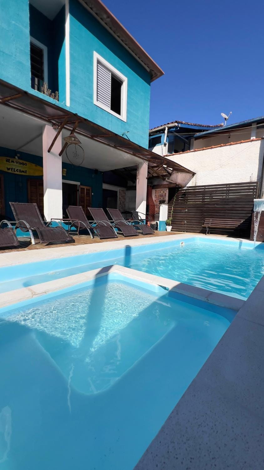 Property building, Day, Pool view, Swimming pool, sunbed