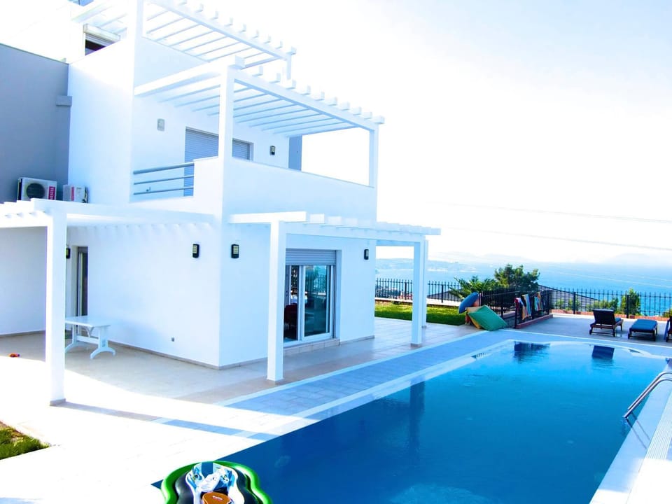 Property building, Patio, Day, Natural landscape, Pool view, Sea view, Swimming pool, sunbed