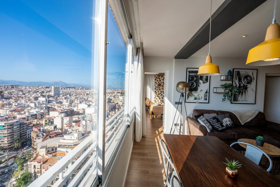Day, View (from property/room), Living room, Seating area, Dining area, City view
