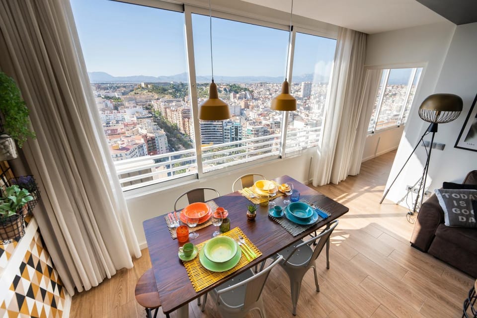 Day, View (from property/room), Living room, Seating area, Dining area, City view