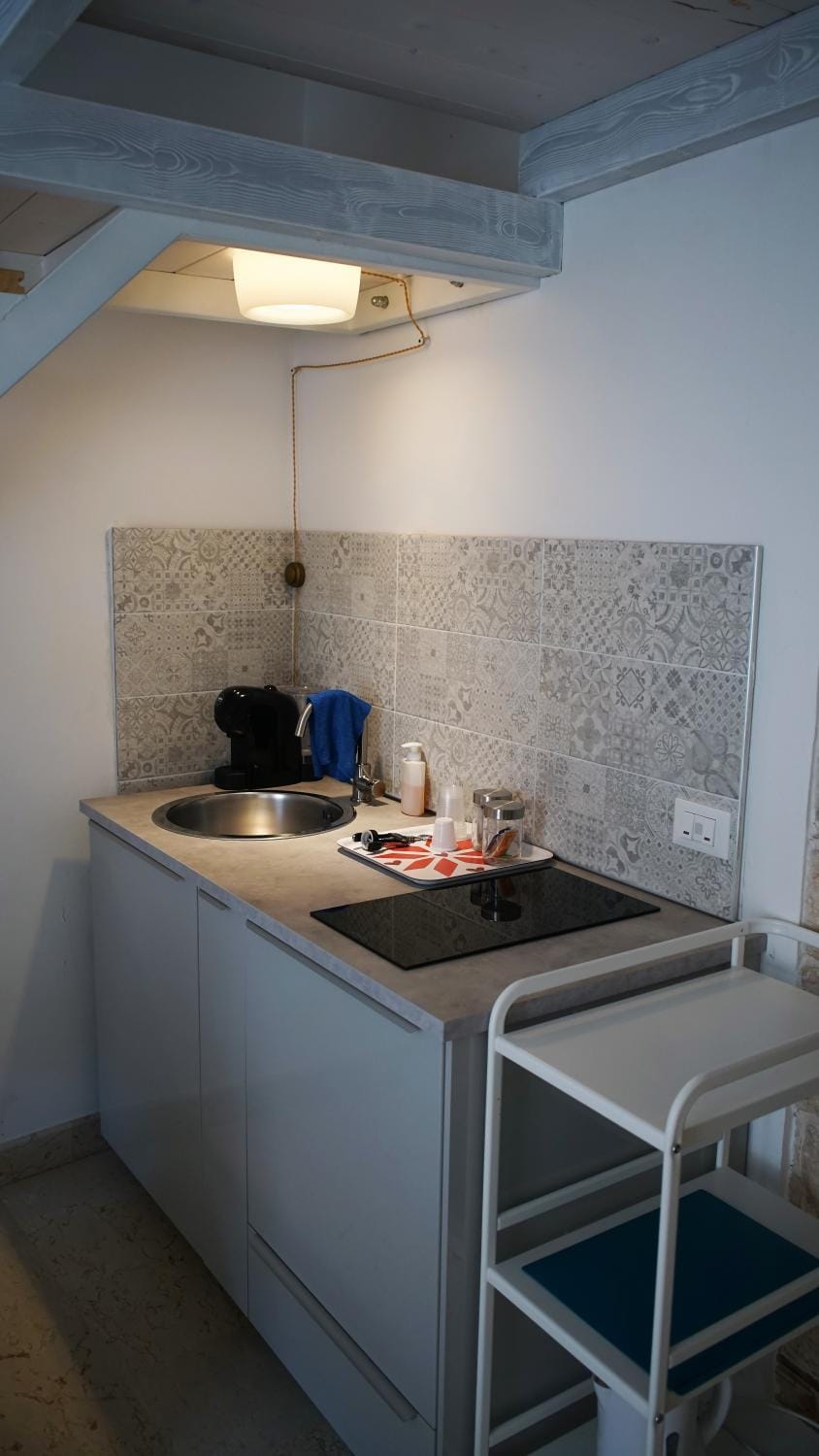 Kitchen or kitchenette, stove