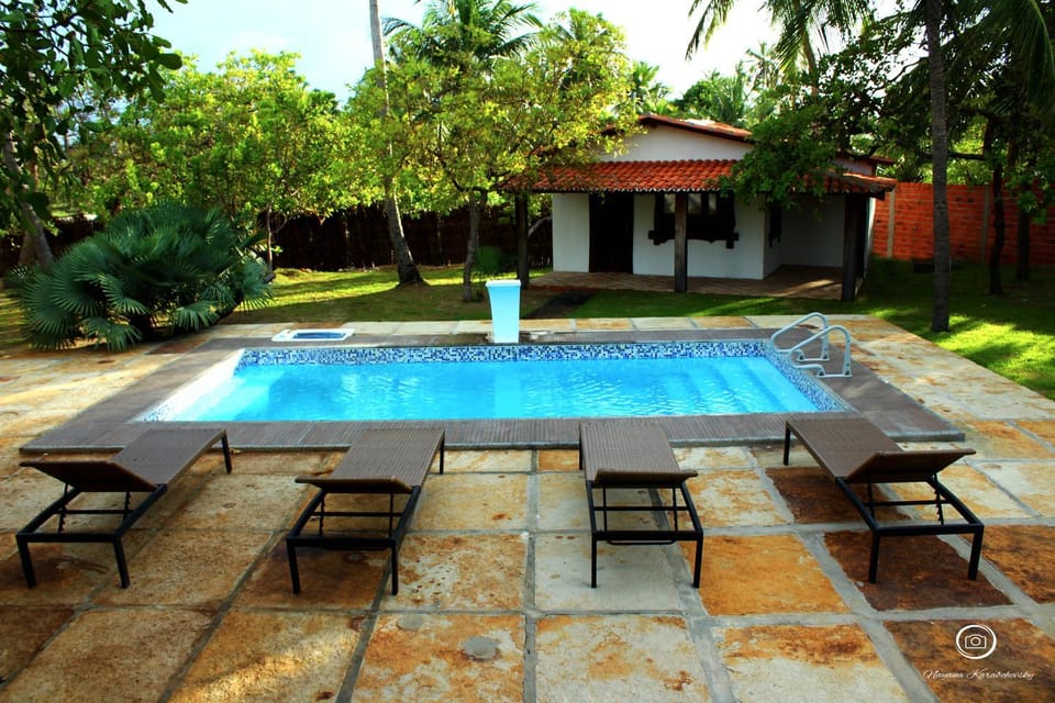 Property building, Garden, Pool view, Swimming pool, sunbed
