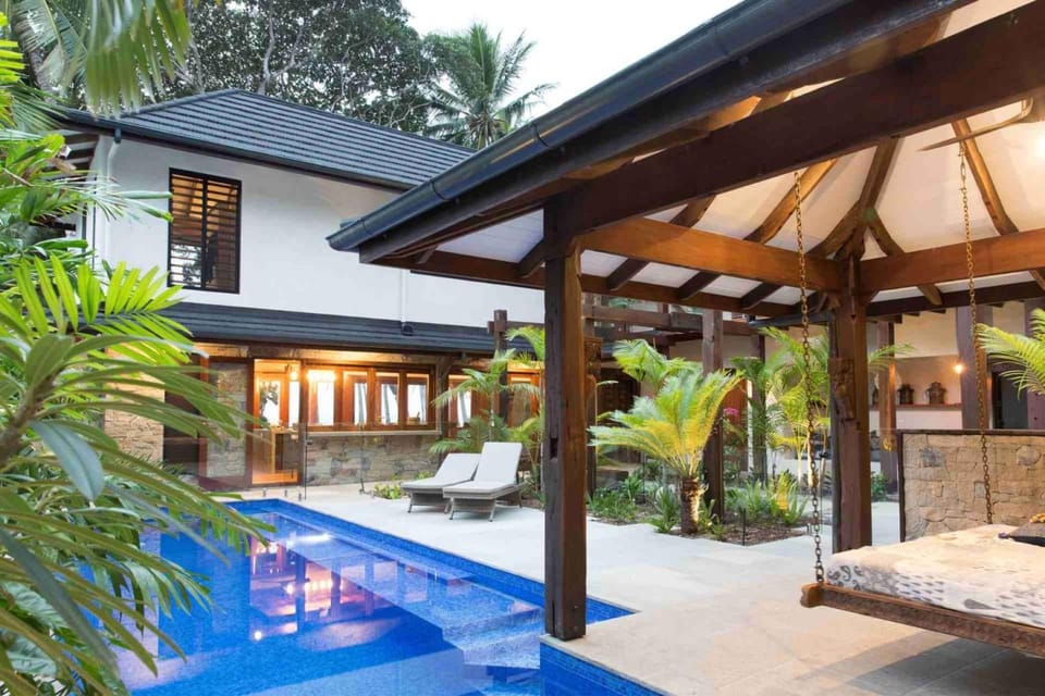 Property building, Patio, Garden, Swimming pool, sunbed