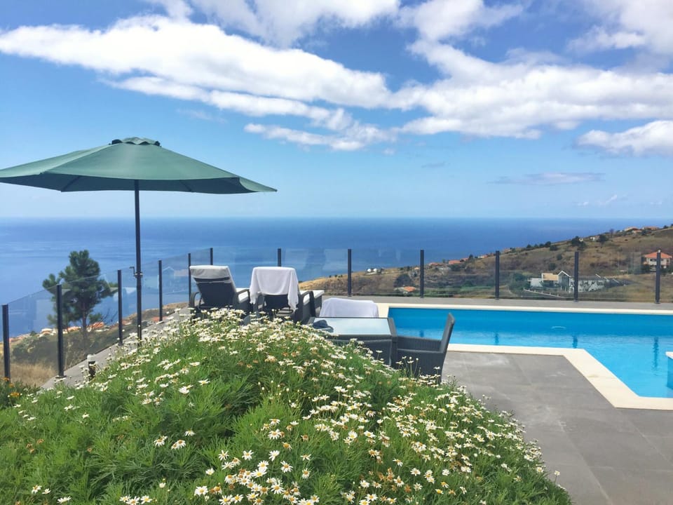 View (from property/room), Mountain view, Pool view, Sea view, Swimming pool, sunbed