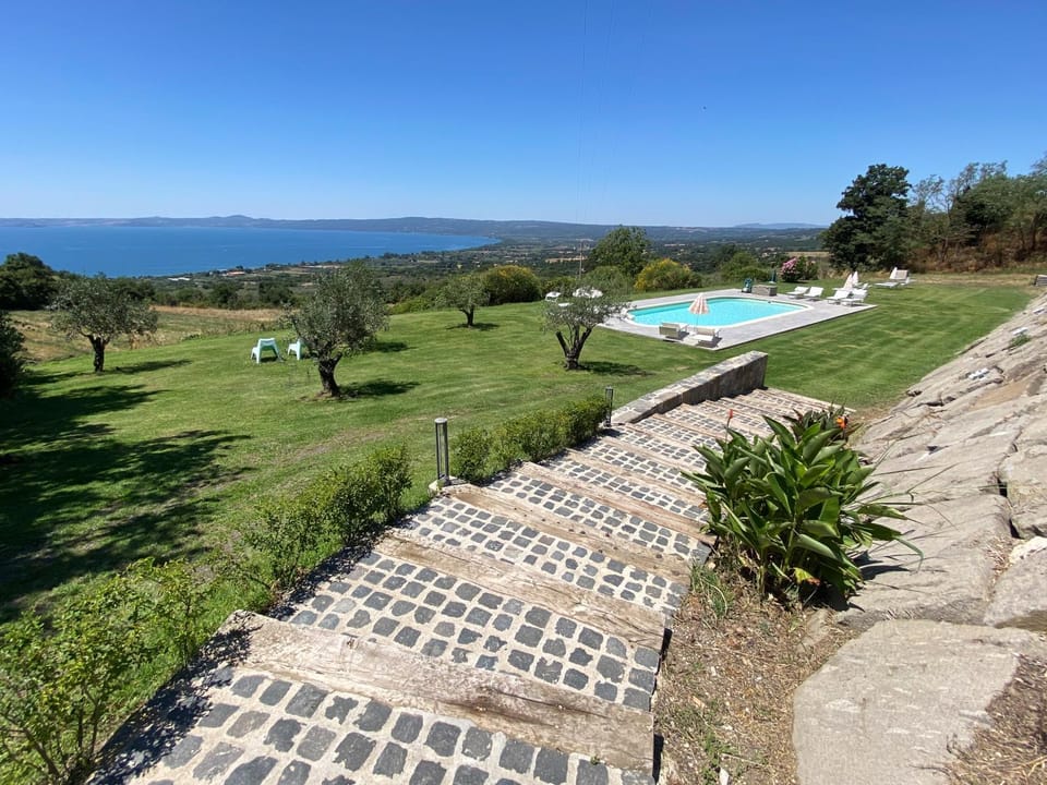 Nearby landmark, Spring, Day, Natural landscape, Mountain view, Pool view, Swimming pool, sunbed