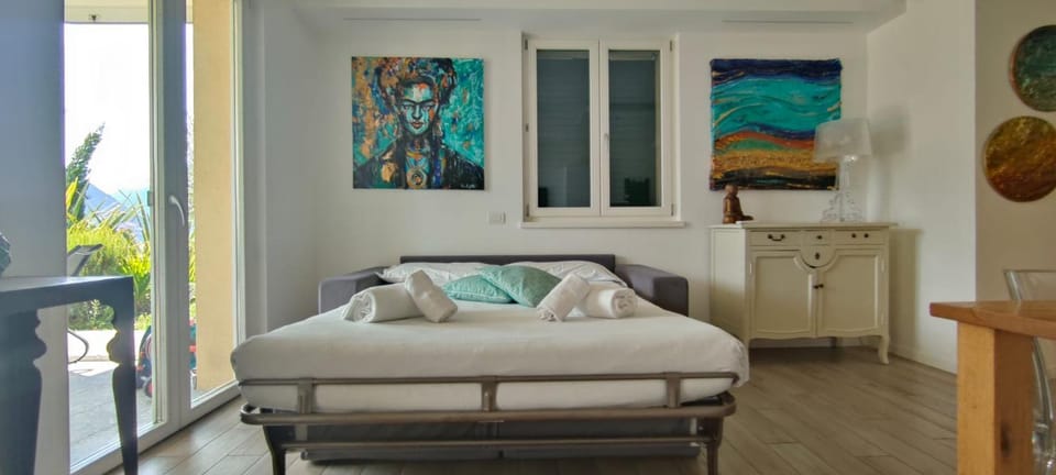 Magic Garden with Jacuzzi-Pool and Luxury Lake Como view Apartment in Lenno