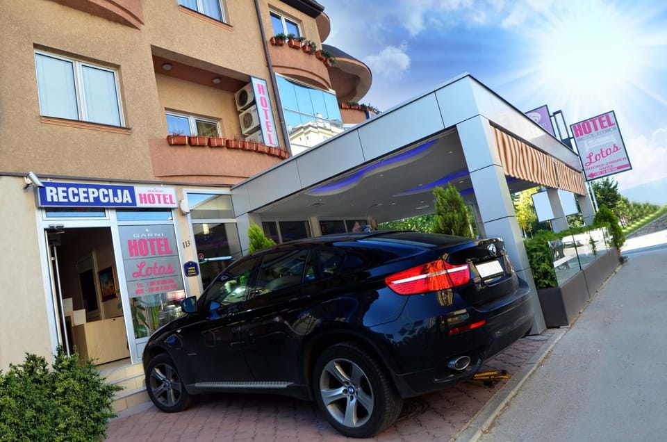 Property building, Facade/entrance, Property logo or sign, Parking