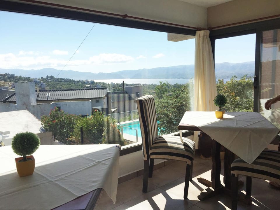 Day, Natural landscape, View (from property/room), Living room, Dining area, City view, Lake view, Mountain view, Pool view